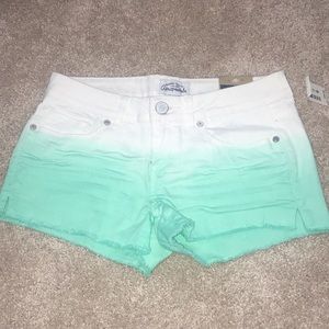 White and teal ombre jean shorts